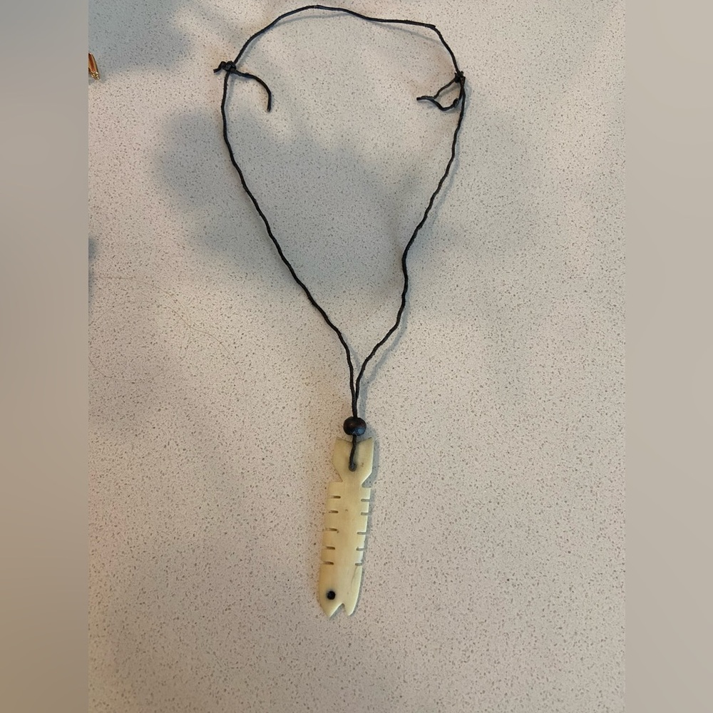 Very unique fish necklace carved from bone